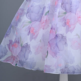Vibrant purple flower prints with puffed sleeves and corsage work Party Dress