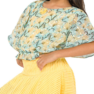 Stylish floral print top with pleated yellow skirt