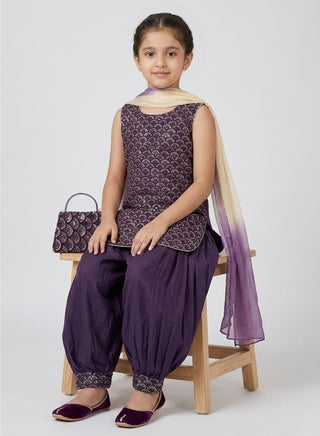 Girl wearing a embroidered sleeveless kurta with matching Patiala salwar and chiffon dupatta ethnic wear set for kids aged 4–12 years.
