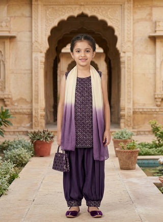 Girl wearing a embroidered sleeveless kurta with matching Patiala salwar and chiffon dupatta ethnic wear set for kids aged 4–12 years.