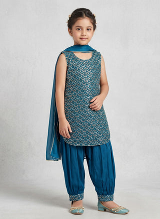 Girl wearing a embroidered sleeveless kurta with matching Patiala salwar and chiffon dupatta ethnic wear set for kids aged 4–12 years.