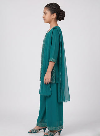 Girl wearing a embroidered sleeveless kurta with matching Patiala salwar and chiffon dupatta ethnic wear set for kids aged 4–12 years.