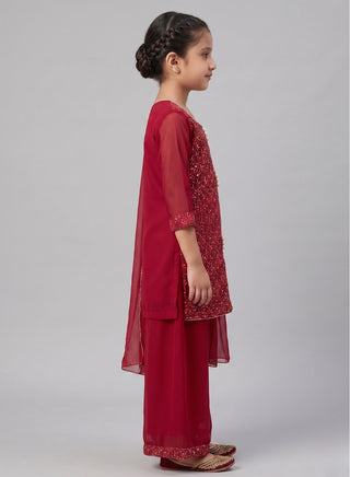 Girl wearing a embroidered sleeveless kurta with matching Patiala salwar and chiffon dupatta ethnic wear set for kids aged 4–12 years.