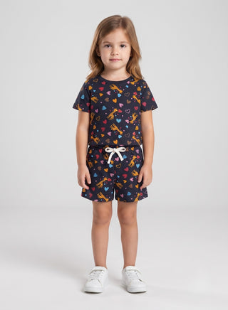 Girl wearing beige floral print cotton t-shirt and matching drawstring shorts set, front view — summer casual outfit for ages 1 to 12 years