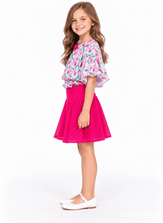 Elegant floral print top with pleated pink skirt