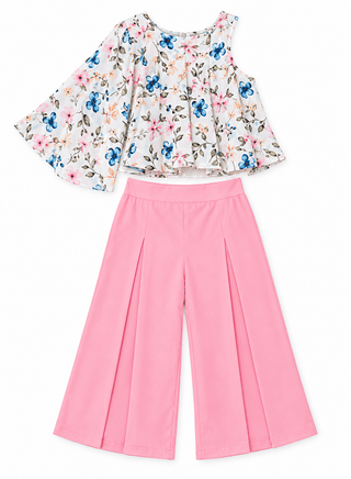 Trendy floral asymmetrical top with pink pleated pants