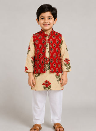 Boy wearing a cream floral printed kurta with a red floral Nehru jacket and white pajama ethnic wear set for kids aged 1–10 years.