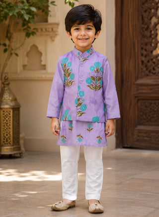 Boy wearing a lavender floral printed cotton kurta with white pajama ethnic wear set for kids aged 1–10 years.