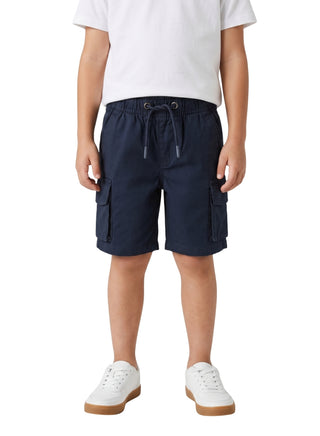 Boy wearing navy blue cargo shorts with an elastic drawstring waist and side utility pockets for ages 9 months to 7 years.