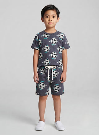 Boy wearing grey soccer print cotton t-shirt and matching drawstring shorts set for kids, front view — summer casual outfit for ages 1 to 12 years
