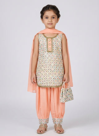 Girl wearing a mint green embroidered sleeveless kurta with matching Patiala salwar and chiffon dupatta ethnic wear set for kids aged 4–12 years.