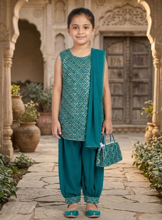 Girl wearing a teal green embroidered sleeveless kurta with matching Patiala salwar and chiffon dupatta ethnic wear set for kids aged 4–12 years.