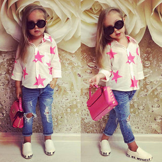 Star printed pink shirt with ripped denim pant for girls